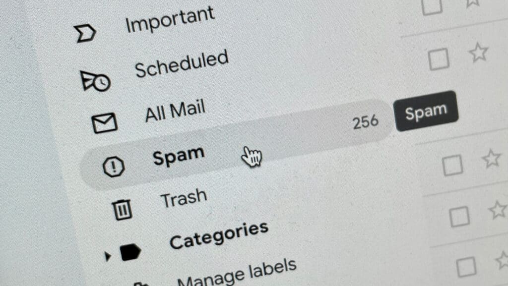 Close-up of a spam button on a computer screen